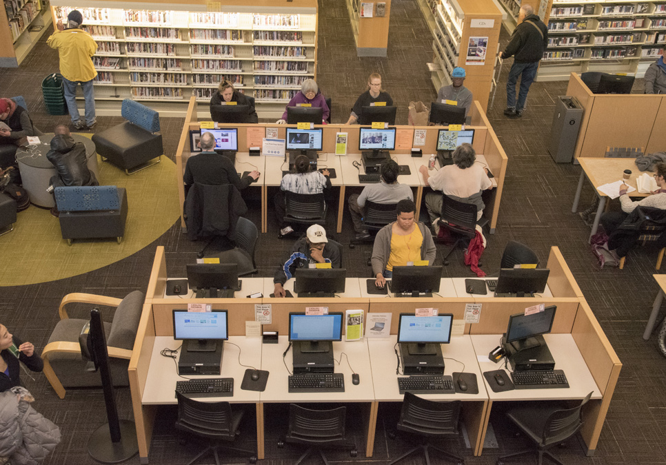 Library patrons in the public computer area at the Capitol Hill Branch