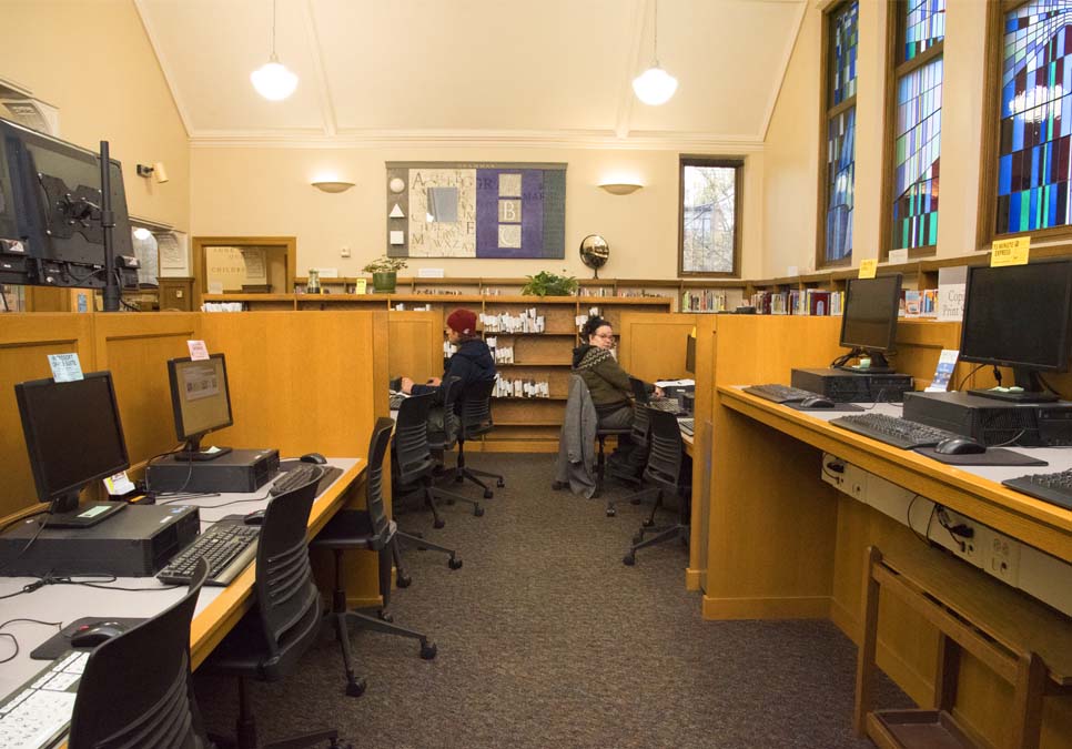 Library patrons using public computers at the Queen Anne Branch