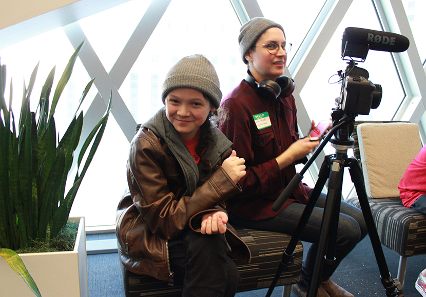 Clear Sky member Cante said that the Licton Springs project with The Seattle Public Library helped him learn how to work with cameras, interview elders and learn about Licton Springs. Pictured with Indigenous showcase mentor Shann.
